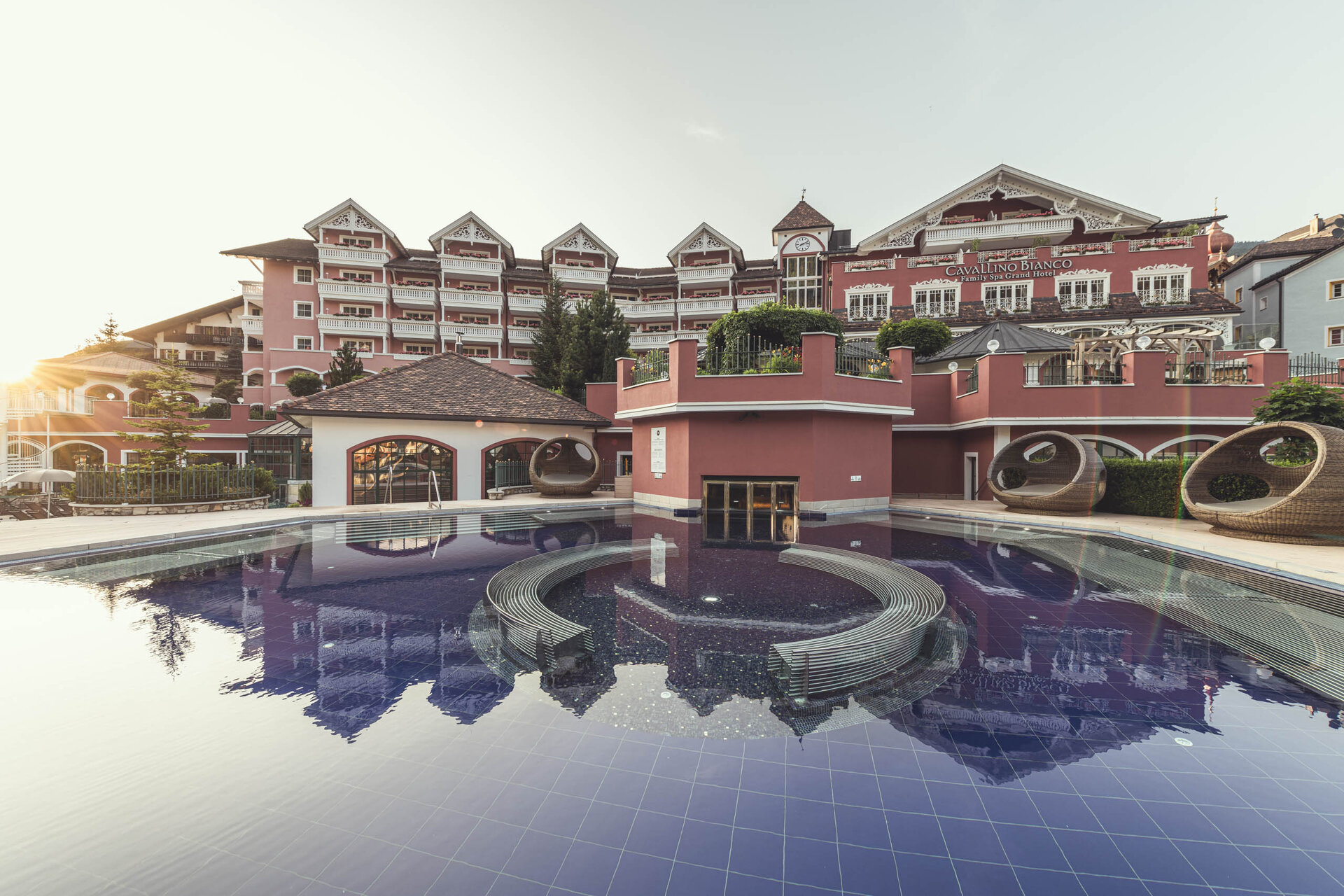 The external pool of the Cavallino bianco ortisei family hotel